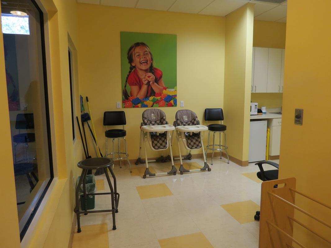 Photo of legoland florida duplo baby care center mothers room high chairs.