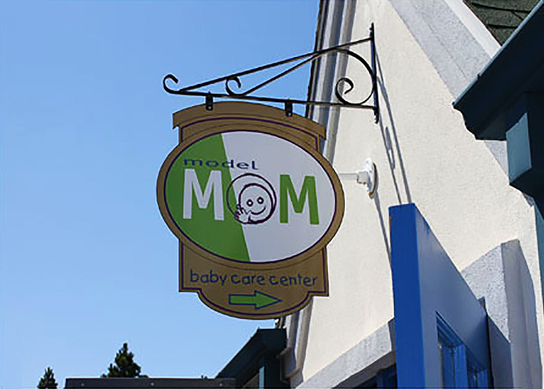 Photo of legoland california model mom babycare center room sign.