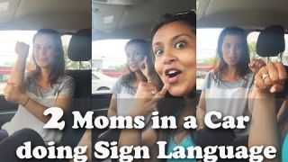 2 Moms in a Car doing Sign Language